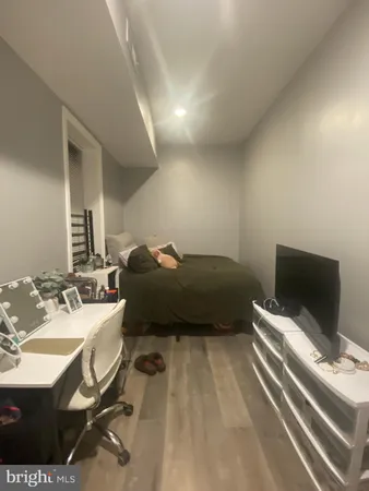 a hotel room with two beds and a television