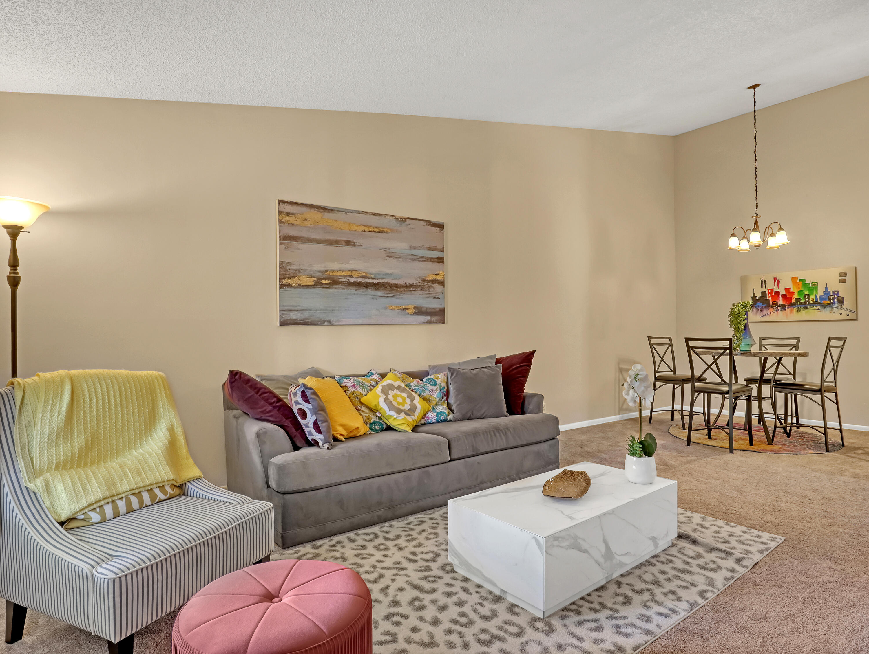 a living room with furniture and a couch