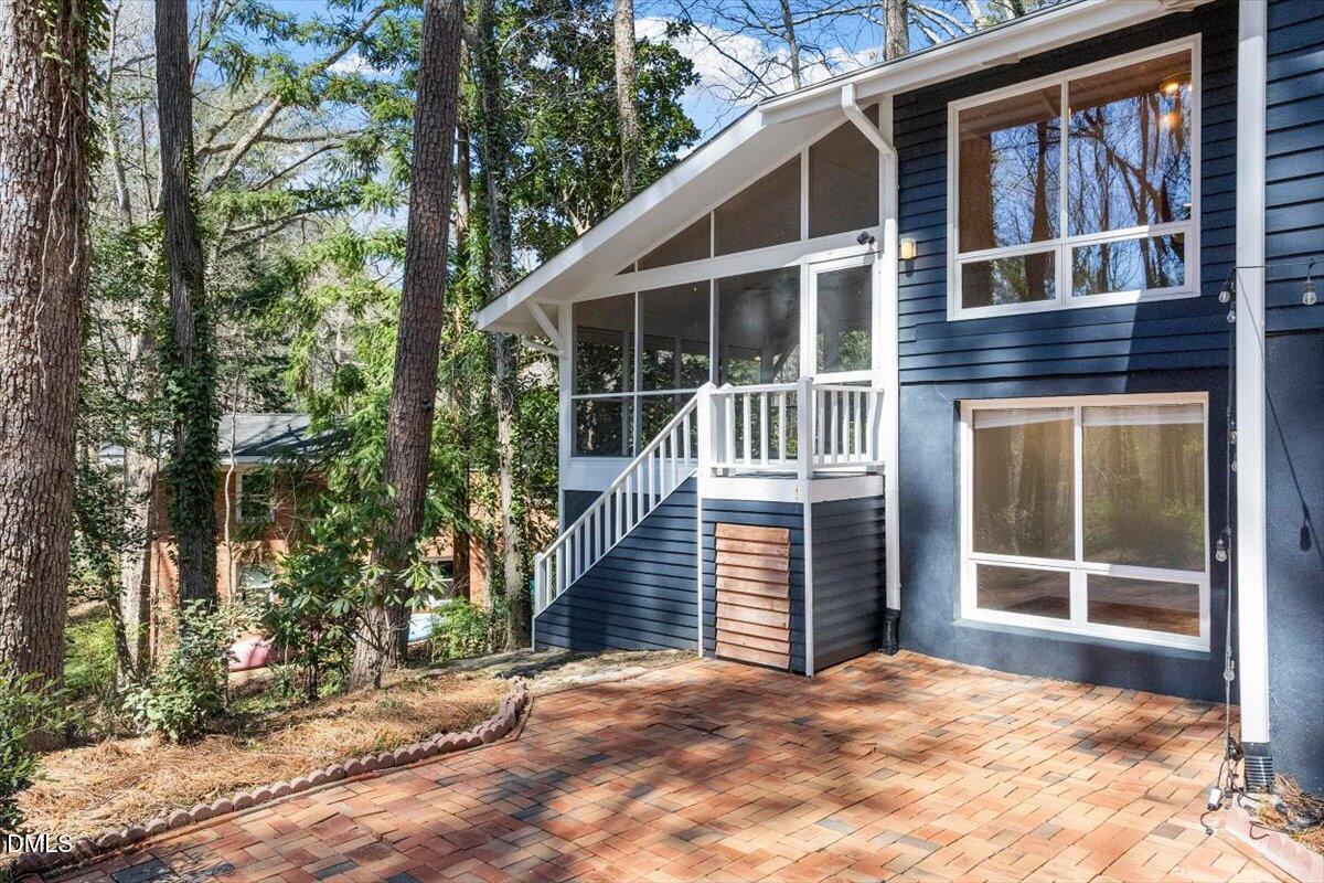 4805 Rembert Drive Raleigh, NC 27612 - Photo 42 of 45 a view of a house with a tree front of house