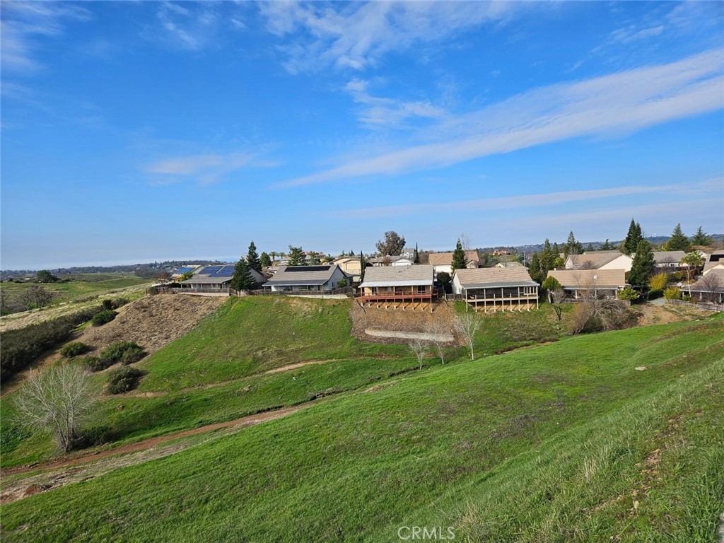 1121 Paradise Peak Road Valley Springs, CA 95252 - Photo 8 of 10 a view of a lake with houses in back