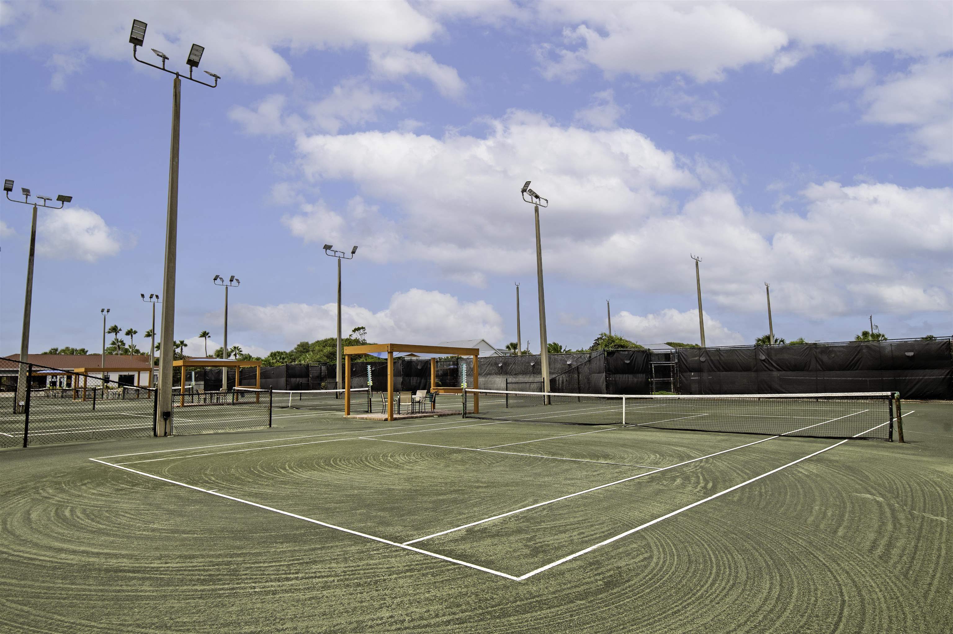 4 Ocean Trace Road, Unit 119 St. Augustine, FL 32080 - Photo 24 of 35 a view of a tennis court