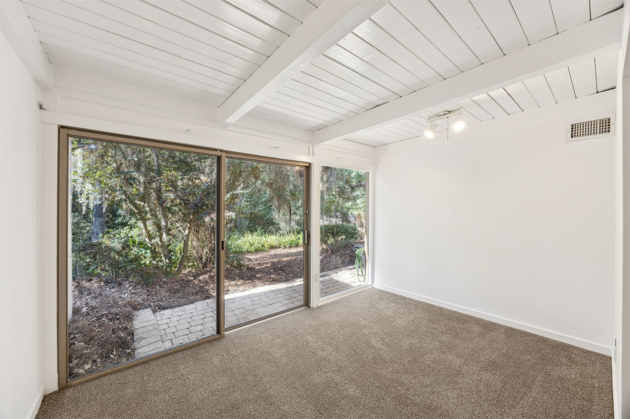 3207 Sea Marsh Road Fernandina Beach, FL 32034 - Photo 17 of 37 a view of a room with sliding glass door