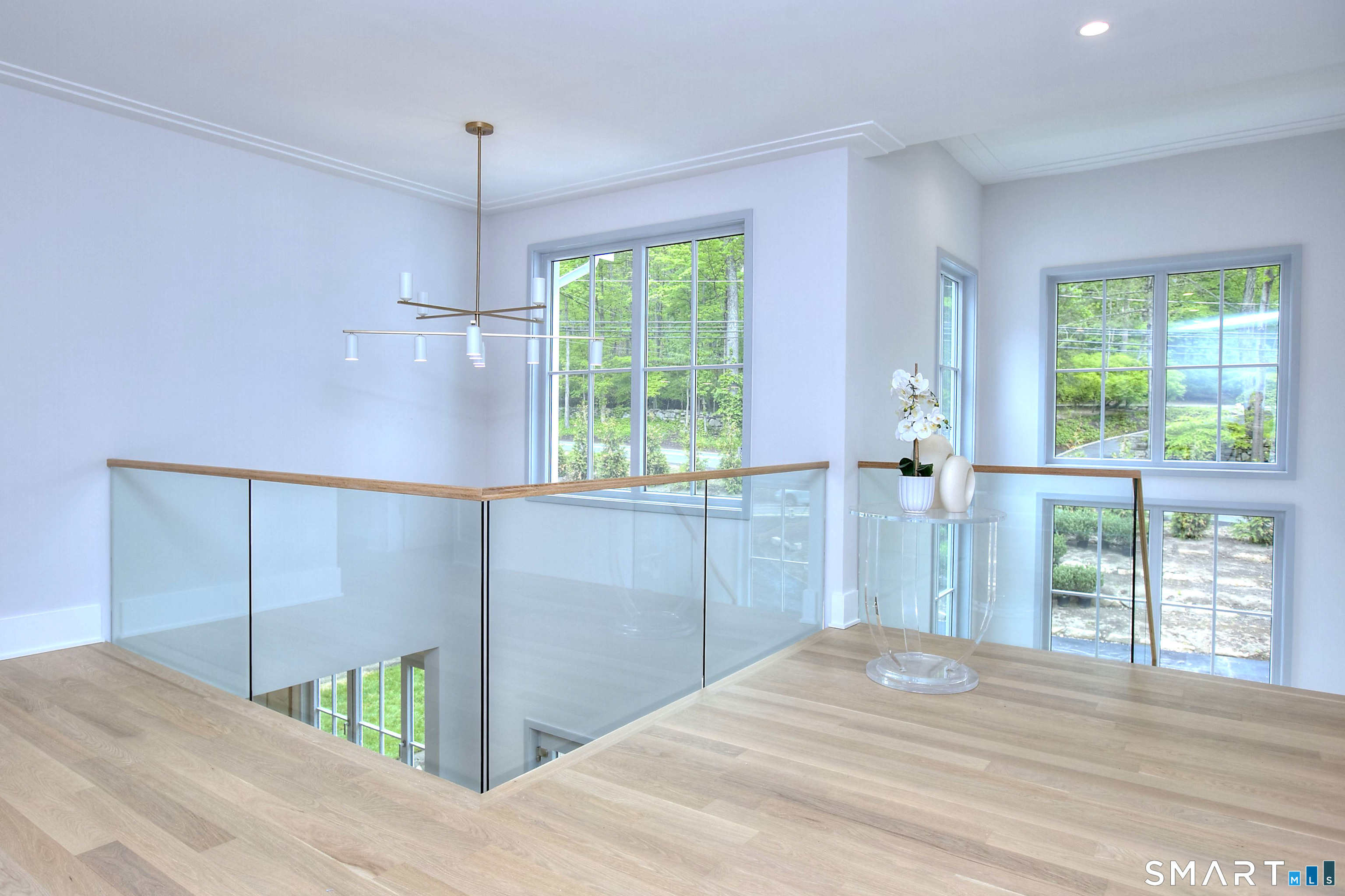 159 Easton Road Westport, CT 06880 - Photo 25 of 40 The main staircase leads to the primary plus three family bedrooms.