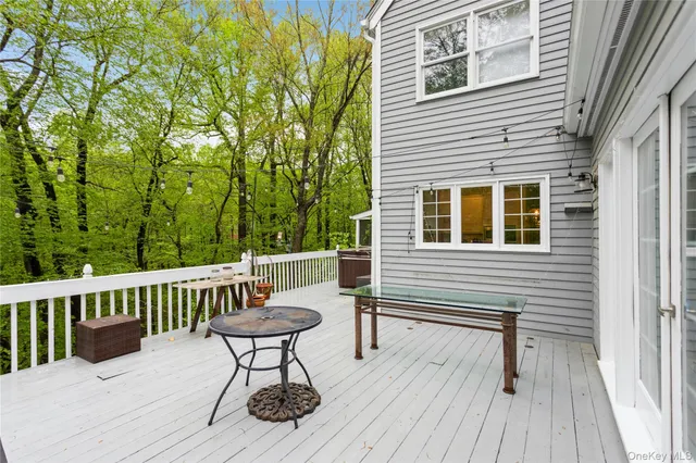 a view of a deck patio and outdoor seating