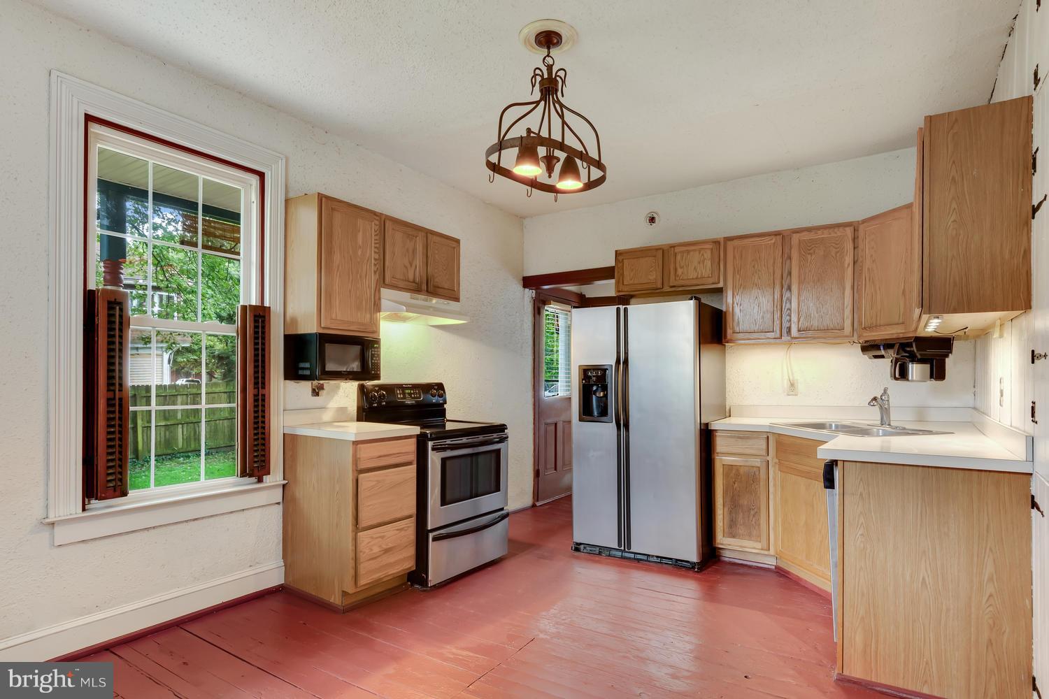 4 West Railroad Street Ridgely, MD 21660 - Photo 9 of 29 Kitchen Leading To Side Porch