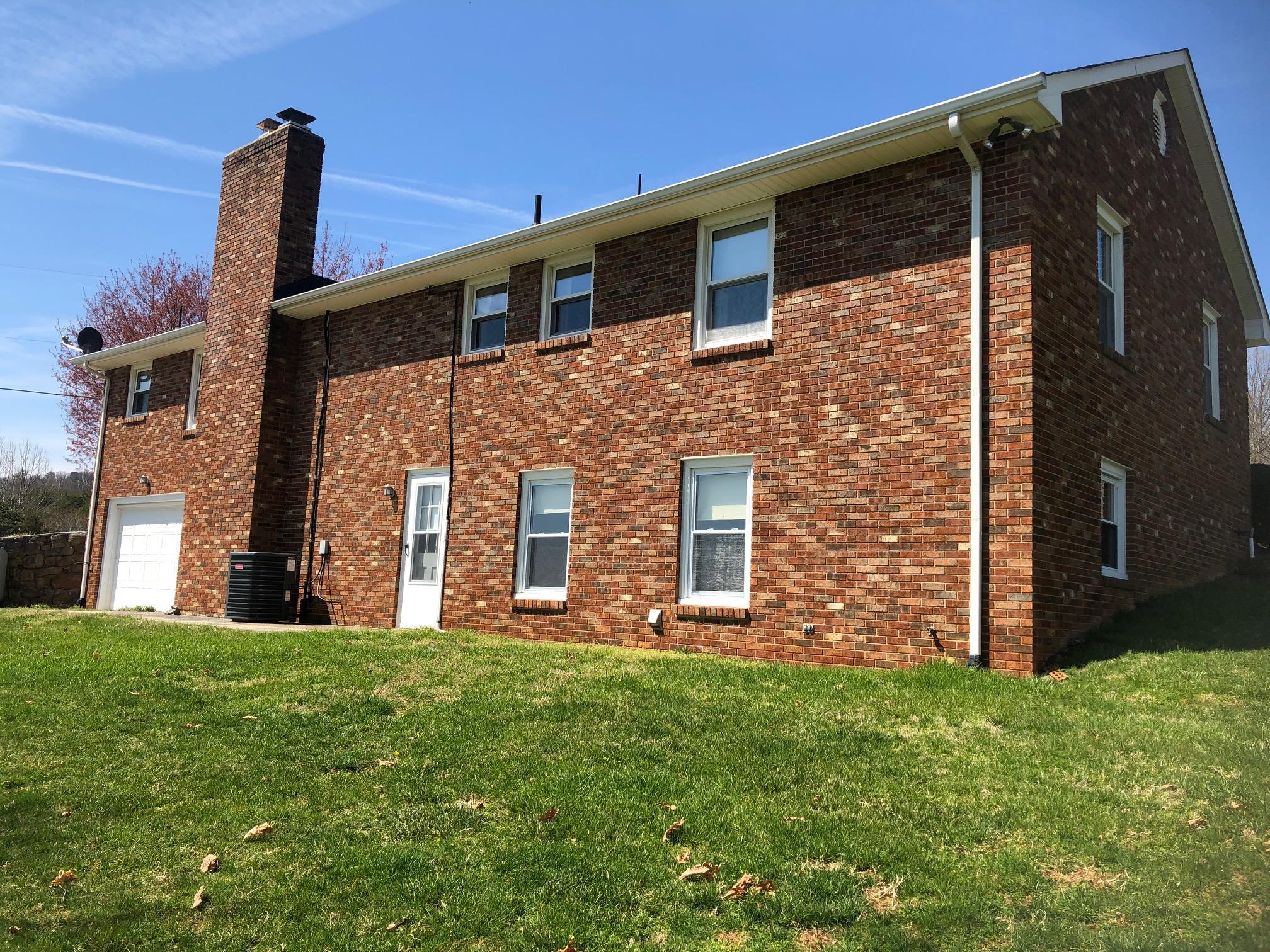 8142 Edwardsville Road Hardy, VA 24101 - Photo 22 of 29 a front view of a house with garden