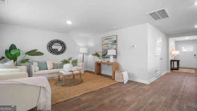 a view of a livingroom from a hallway