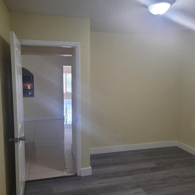 7101 Northwest 97th Avenue Tamarac, FL 33321 - Photo 17 of 23 a view of empty room with wooden floor