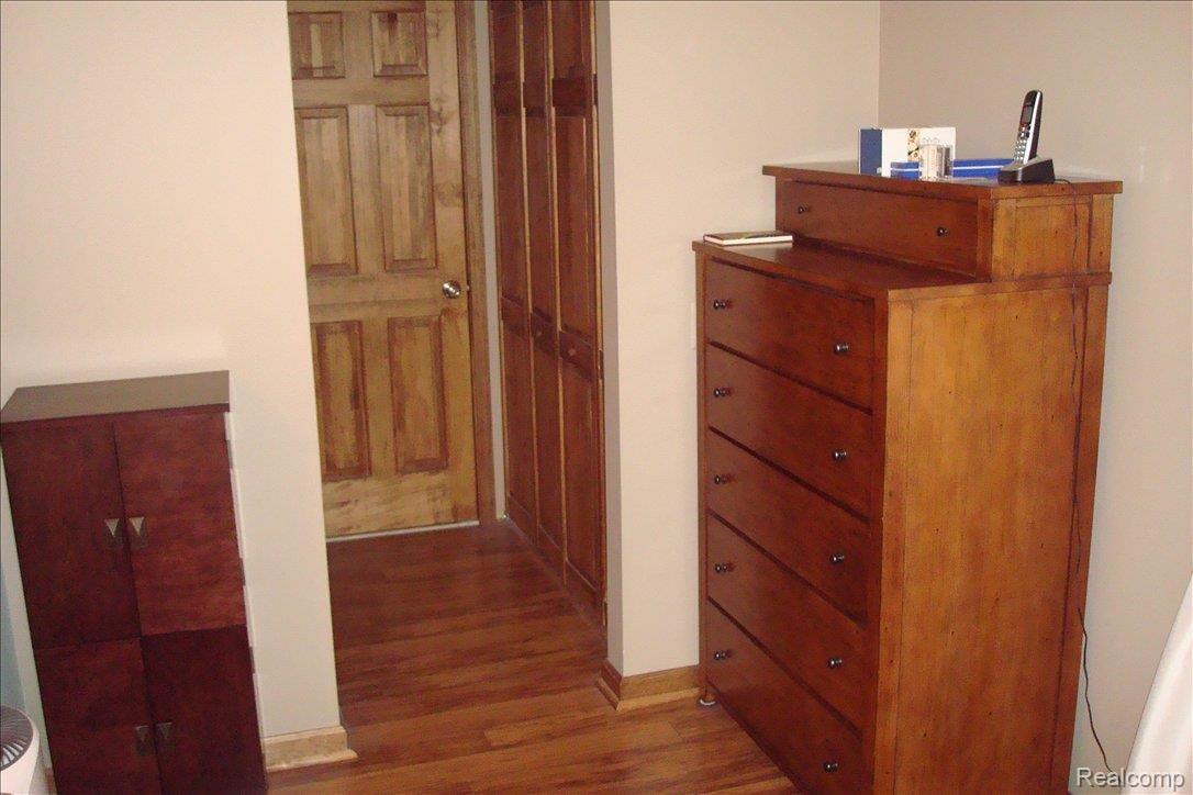 1042 Willow Grove Court, Unit 56 Rochester, MI 48307 - Photo 8 of 13 Private Master Bed Closet & Bath
