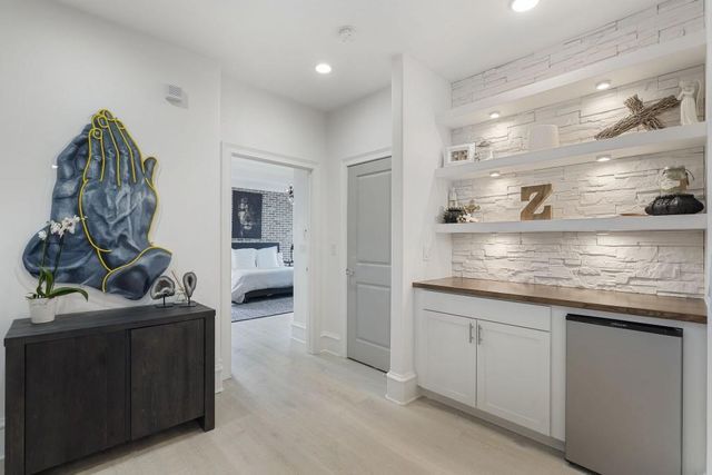 a kitchen with a sink and cabinets