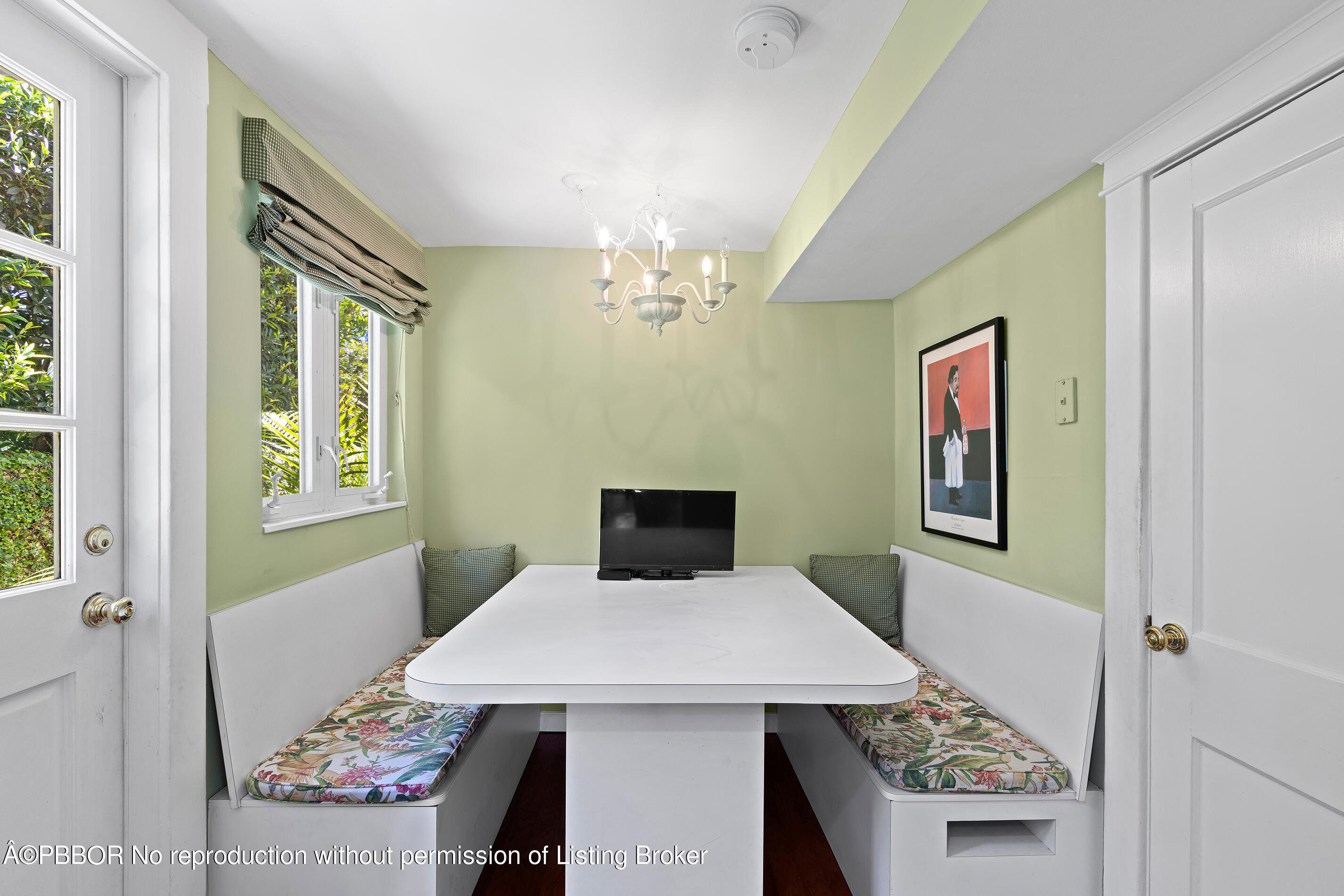 225 South County Road Palm Beach, FL 33480 - Photo 18 of 22 a view of a dining room with a table and chairs