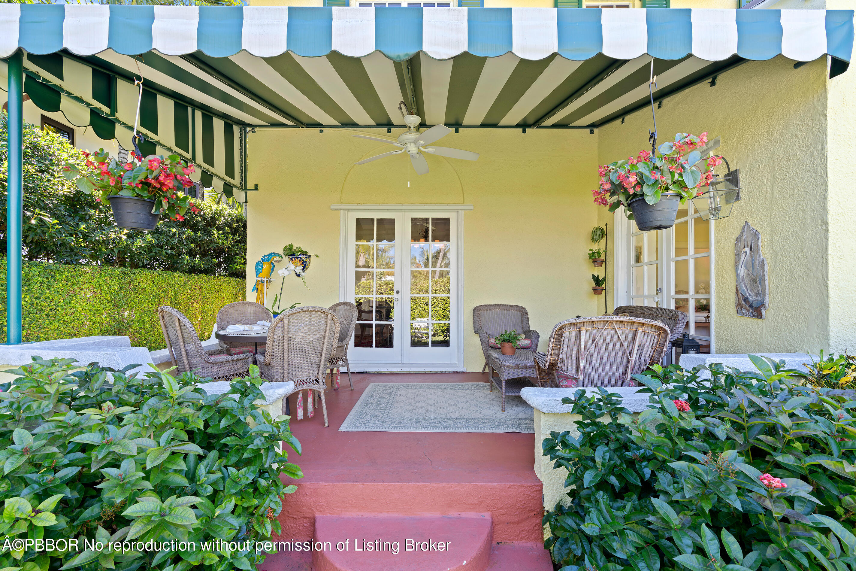 225 South County Road Palm Beach, FL 33480 - Photo 5 of 22 a front view of a house with a seating space