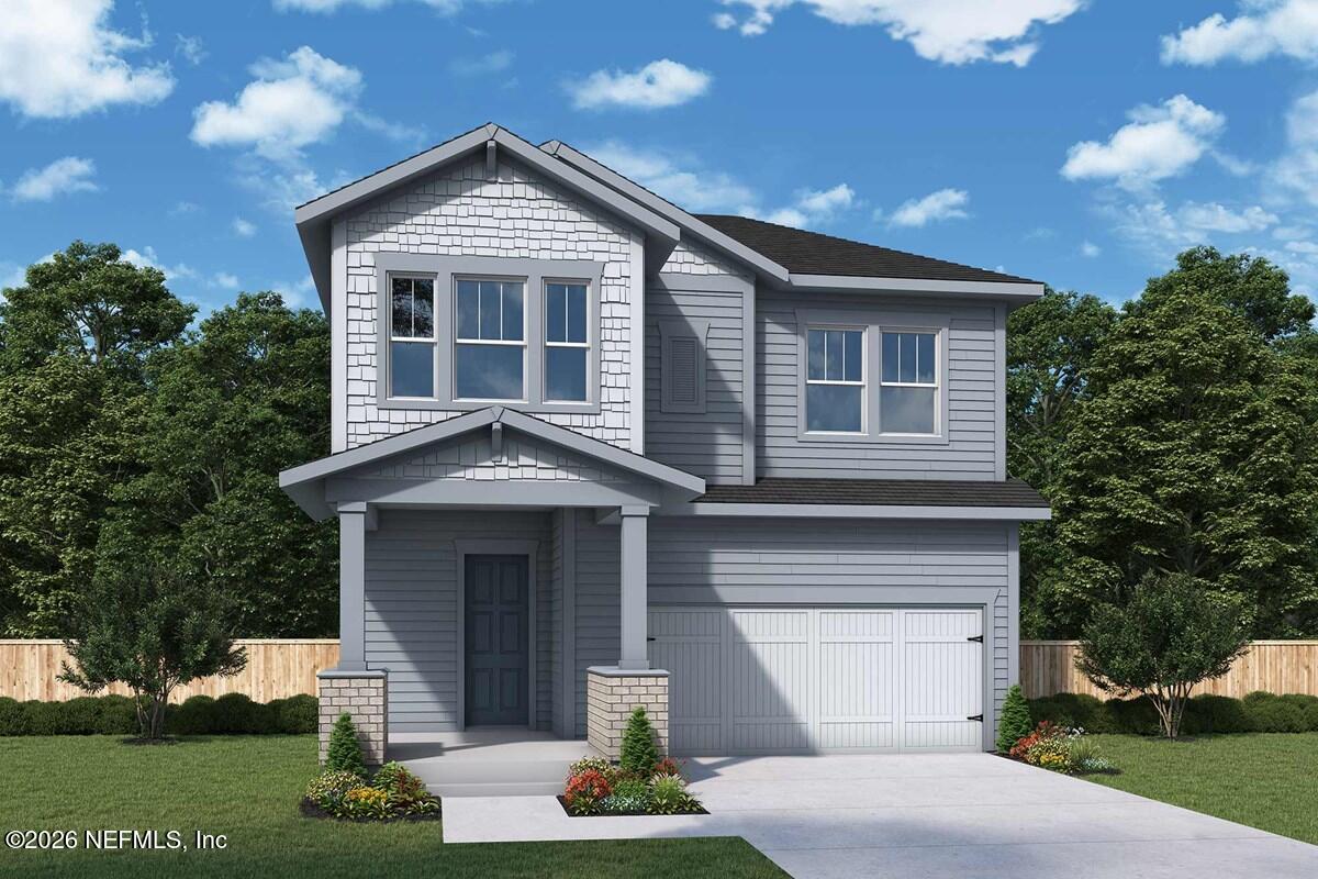 6010 Timber Pines Road Jacksonville, FL 32224 - Photo 1 of 3 a front view of a house with a yard and garage