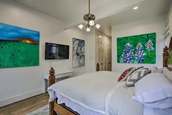 a bathroom with a shower sink and mirror