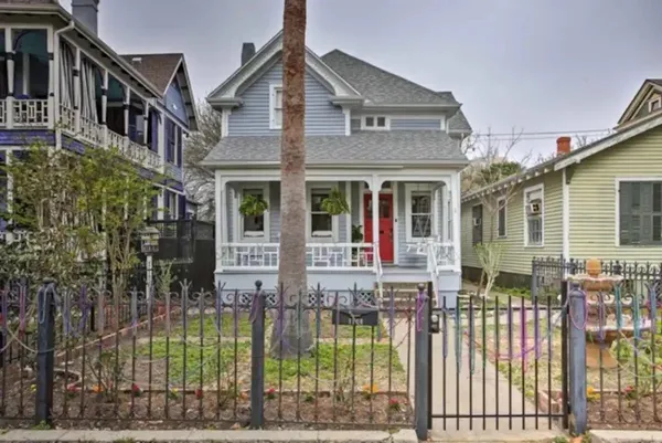 front view of a house with a small yard