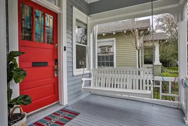 a front view of a house with a porch