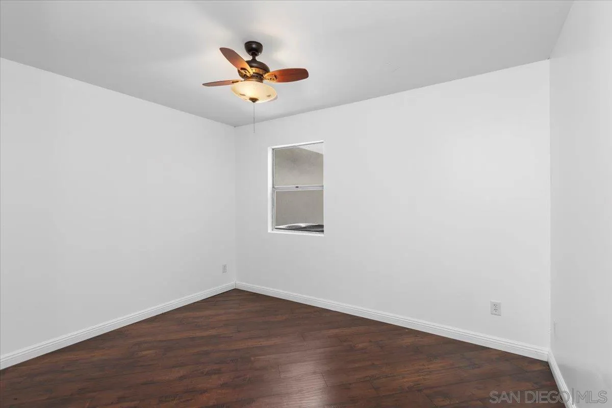 9307 Dalehurst Road Santee, CA 92071 - Photo 14 of 46 a view of a workspace with wooden floor