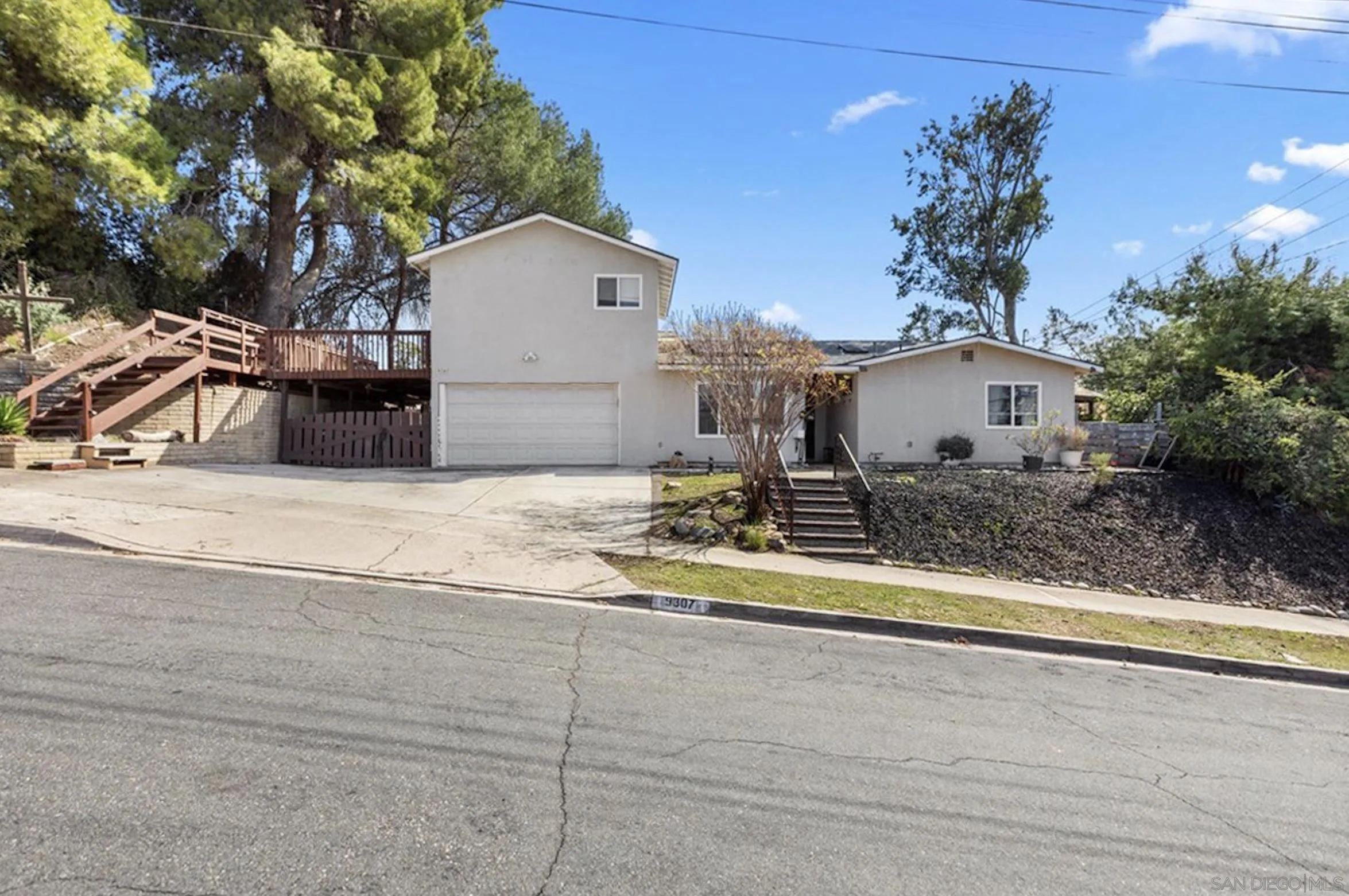 9307 Dalehurst Road Santee, CA 92071 - Photo 19 of 46 a view of a house with a yard