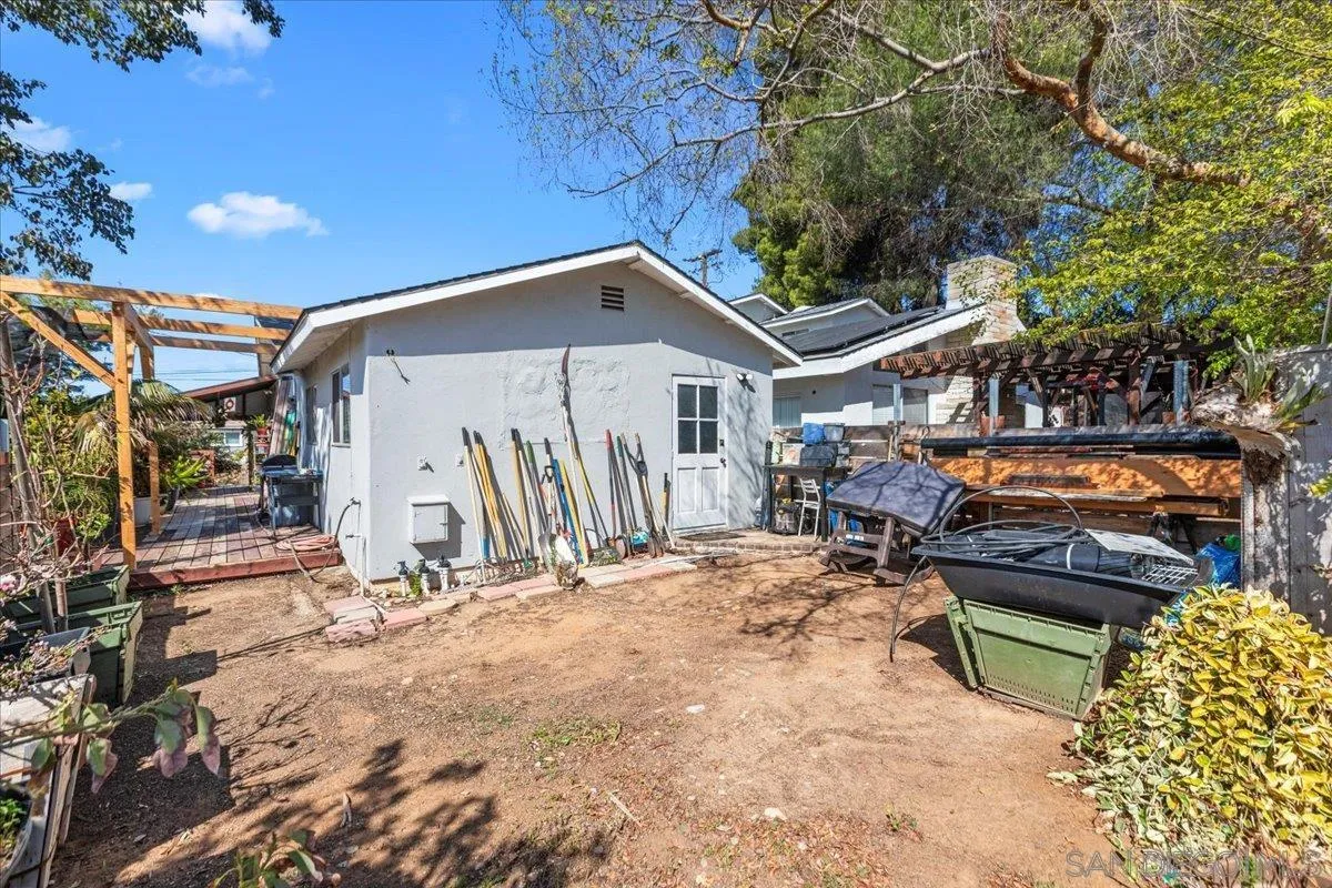 9307 Dalehurst Road Santee, CA 92071 - Photo 23 of 46 a view of a backyard with a patio