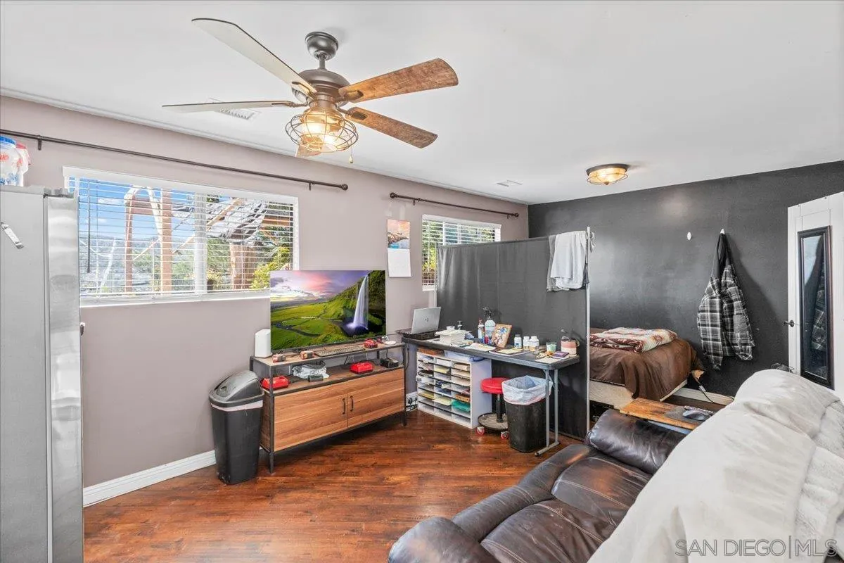 9307 Dalehurst Road Santee, CA 92071 - Photo 24 of 46 a living room with furniture and a flat screen tv