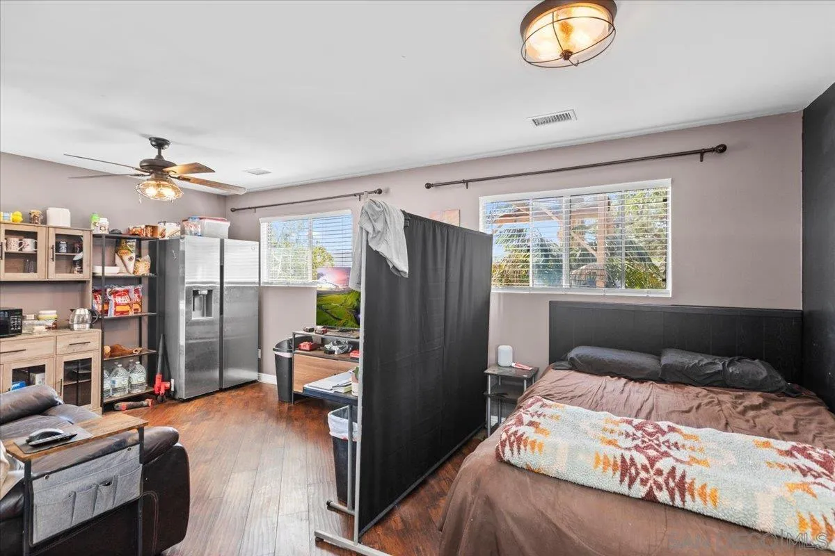 9307 Dalehurst Road Santee, CA 92071 - Photo 25 of 46 a bedroom with furniture and a window