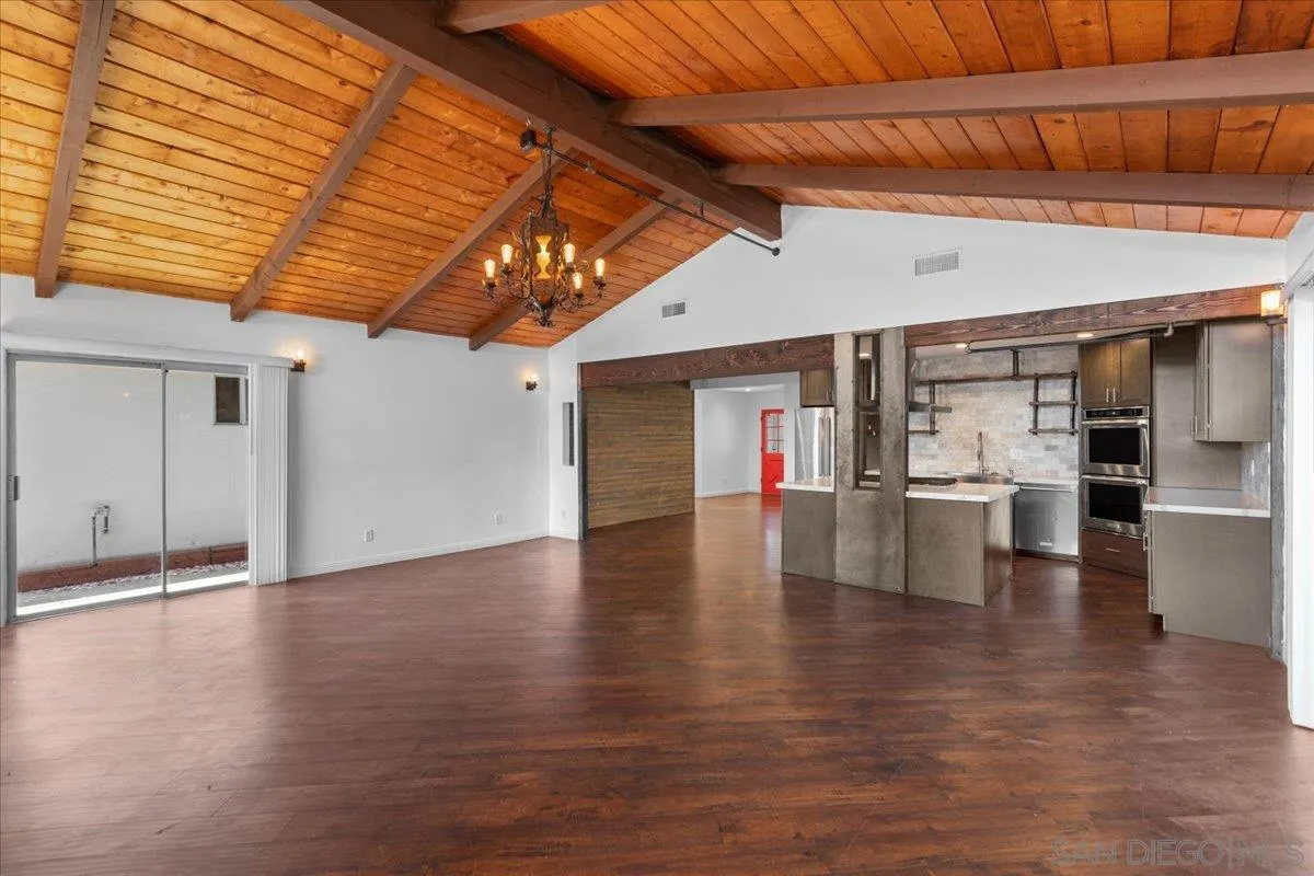 9307 Dalehurst Road Santee, CA 92071 - Photo 3 of 46 a view of an empty room with wooden floor