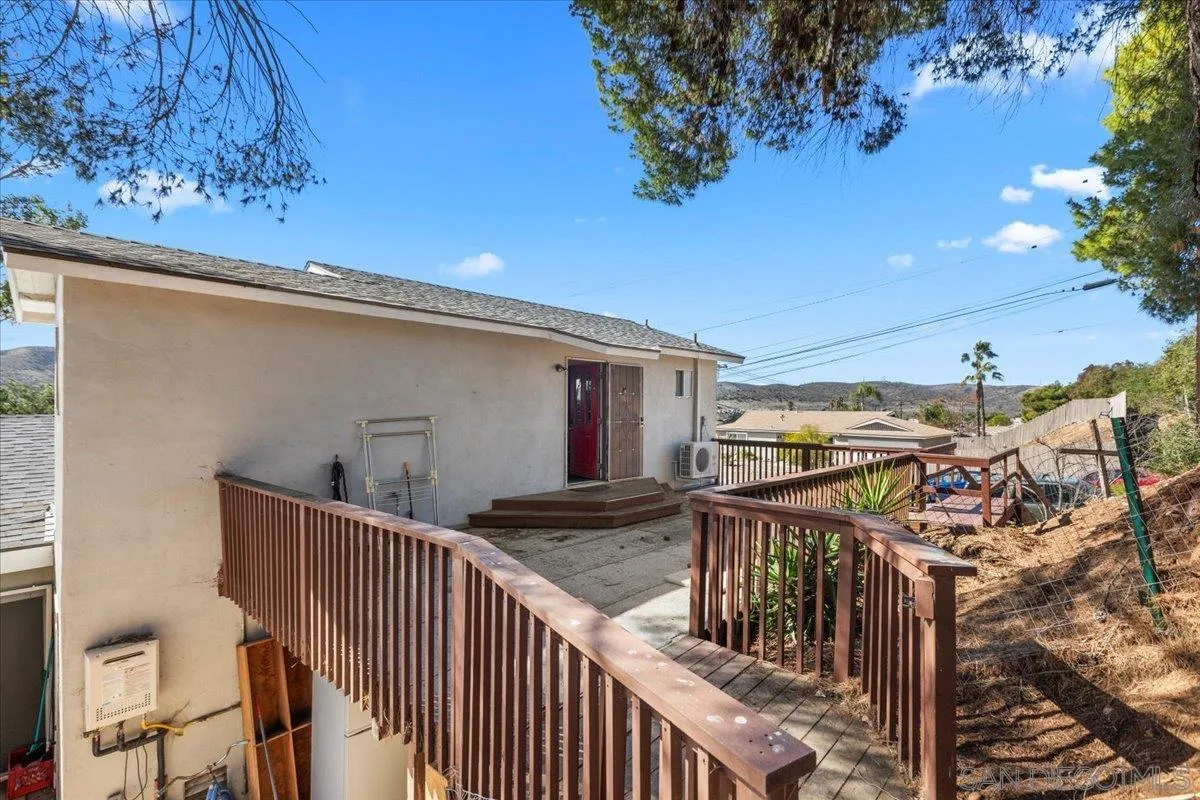 9307 Dalehurst Road Santee, CA 92071 - Photo 36 of 46 a view of balcony with wooden floor and fence