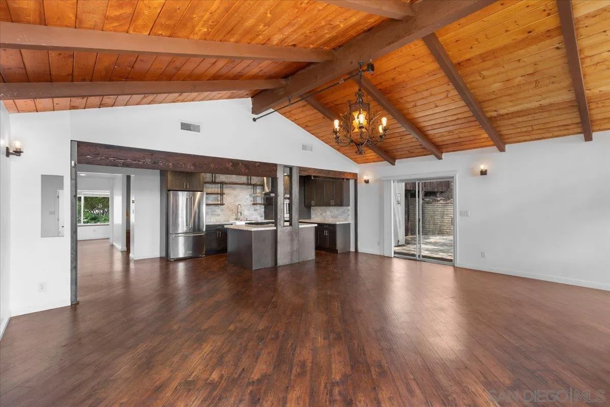 9307 Dalehurst Road Santee, CA 92071 - Photo 4 of 46 a view of a livingroom with furniture and wooden floor