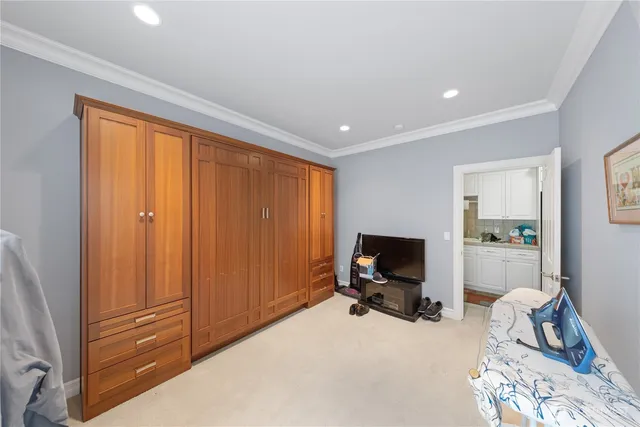 a view of a livingroom with furniture and a flat screen tv
