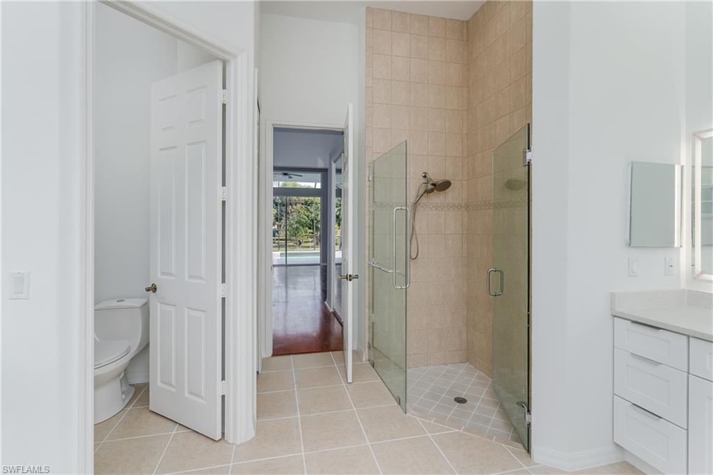 510 13th Street Northwest Naples, FL 34120 - Photo 33 of 50 a bathroom with a shower and a sink