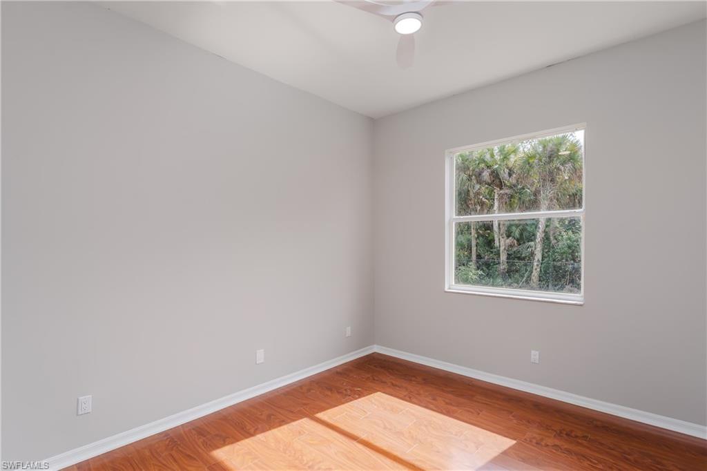 510 13th Street Northwest Naples, FL 34120 - Photo 34 of 50 an empty room with a window