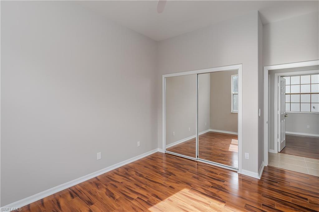510 13th Street Northwest Naples, FL 34120 - Photo 38 of 50 a view of a room with wooden floor and entryway