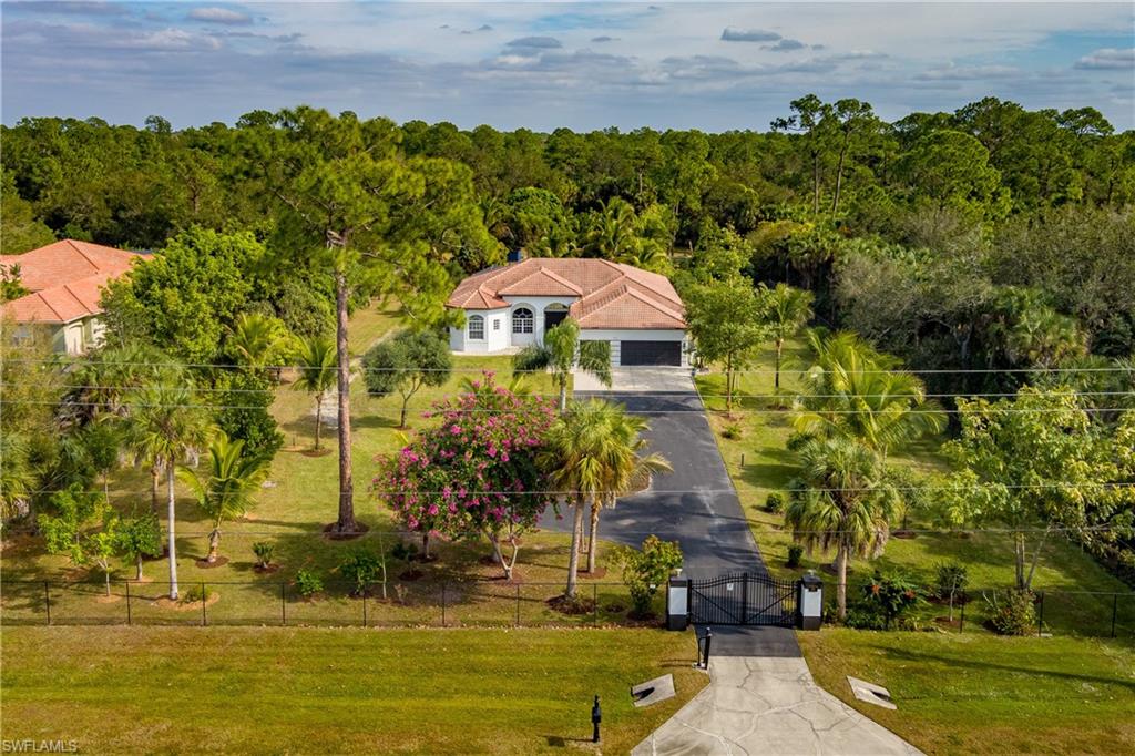 510 13th Street Northwest Naples, FL 34120 - Photo 42 of 50 a view of a swimming pool with a patio