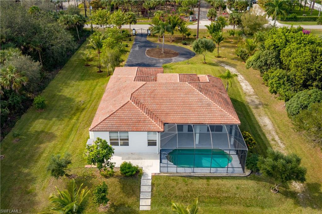 510 13th Street Northwest Naples, FL 34120 - Photo 46 of 50 an aerial view of a house