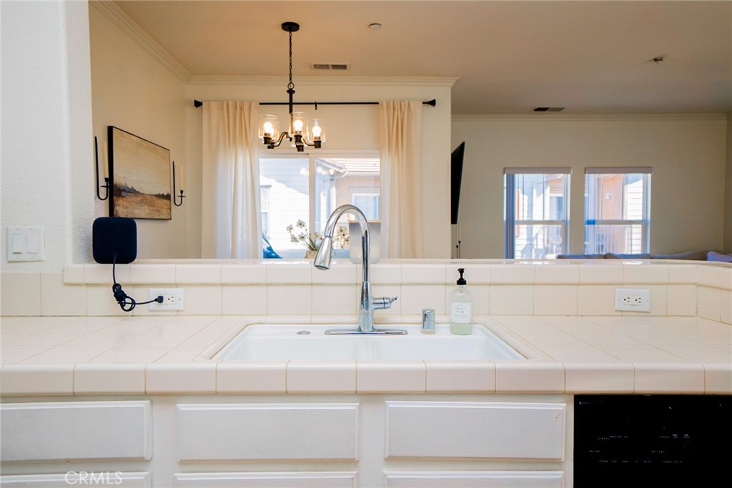 7331 Shelby Place, Unit 91 Rancho Cucamonga, CA 91739 - Photo 15 of 34 a bathroom with a sink and a mirror