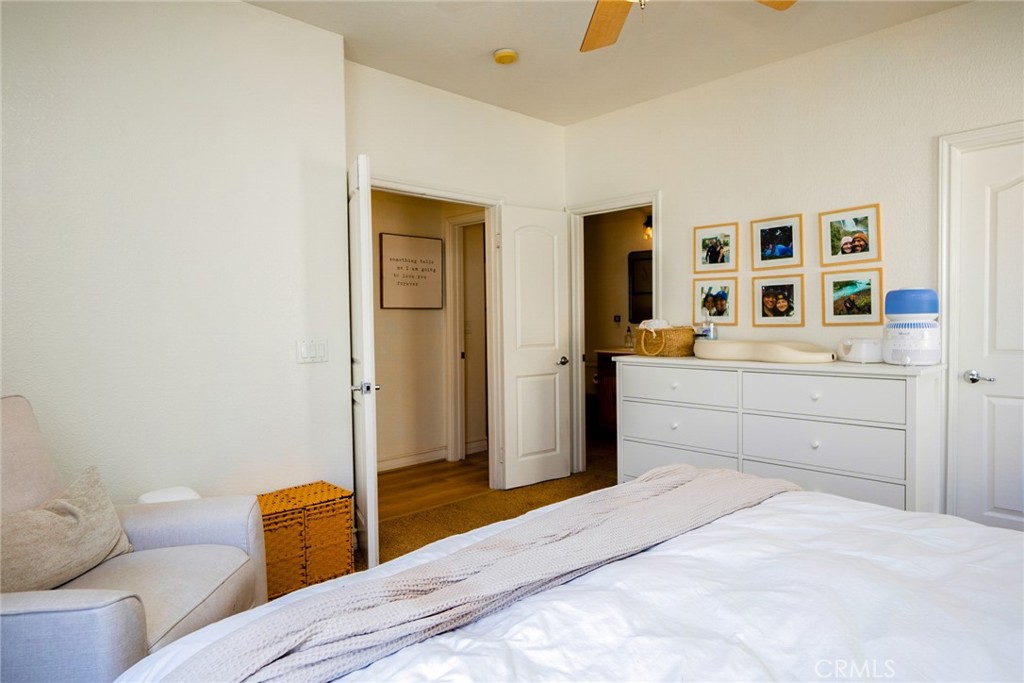 7331 Shelby Place, Unit 91 Rancho Cucamonga, CA 91739 - Photo 17 of 34 a bedroom with a bed and cabinets