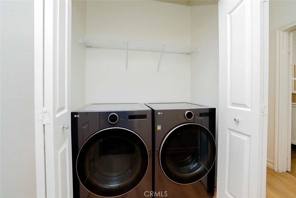 7331 Shelby Place, Unit 91 Rancho Cucamonga, CA 91739 - Photo 22 of 34 a utility room with dryer and washer