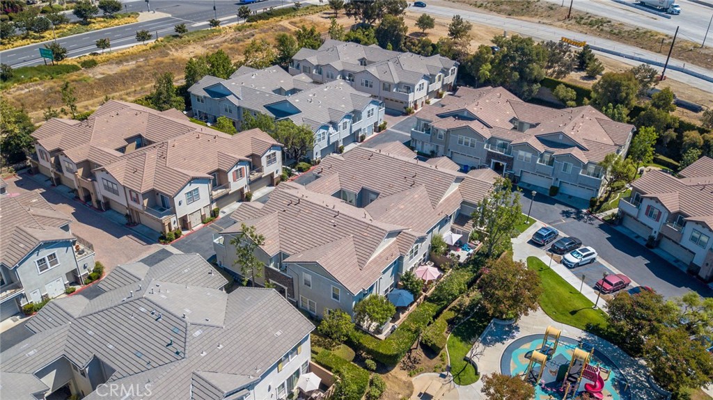 7331 Shelby Place, Unit 91 Rancho Cucamonga, CA 91739 - Photo 29 of 34 an aerial view of residential houses with outdoor space