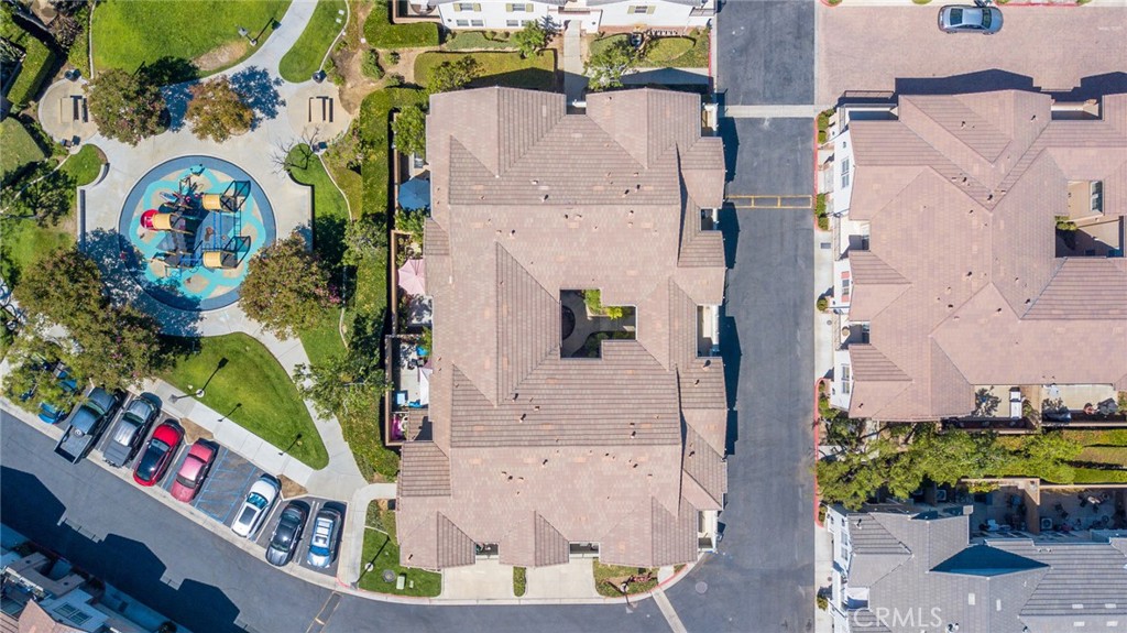 7331 Shelby Place, Unit 91 Rancho Cucamonga, CA 91739 - Photo 32 of 34 an aerial view of a house with a garden and statue
