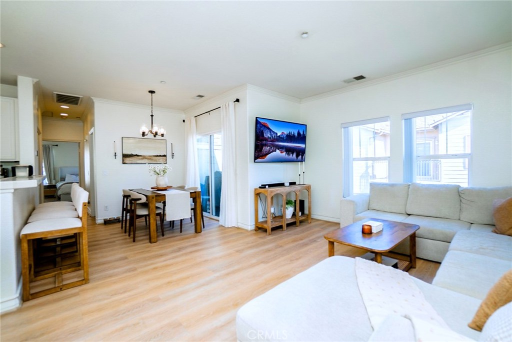 7331 Shelby Place, Unit 91 Rancho Cucamonga, CA 91739 - Photo 5 of 34 a bedroom with furniture and a wooden floor