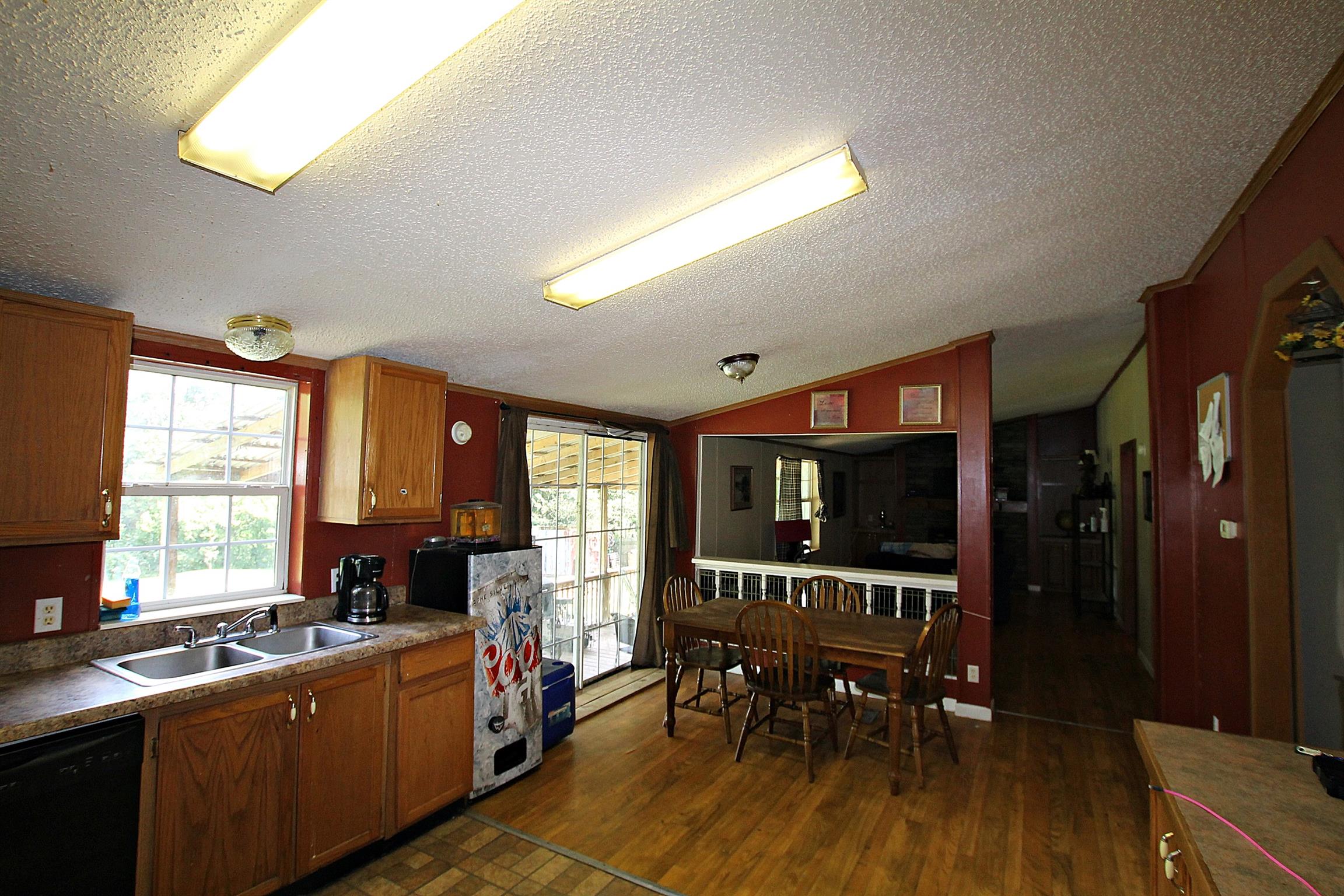 6414 Hoods Branch Road Springfield, TN 37172 - Photo 5 of 11 a kitchen with sink a window and dining table