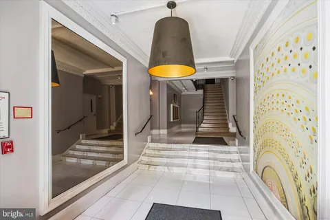 a view of entryway with stairs