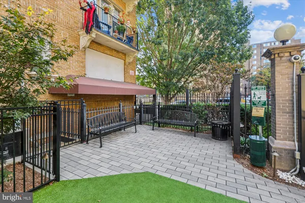 a view of a building with a yard
