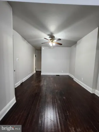 a view of a livingroom with wooden floor