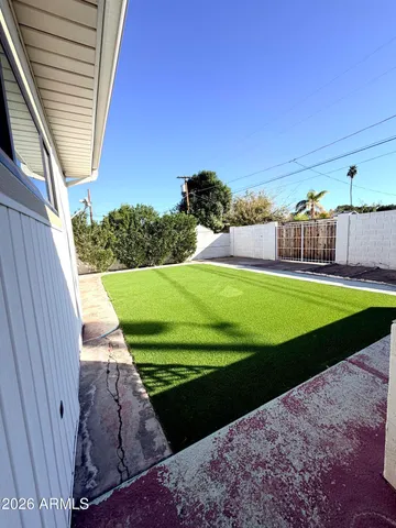 a view of a backyard with a area