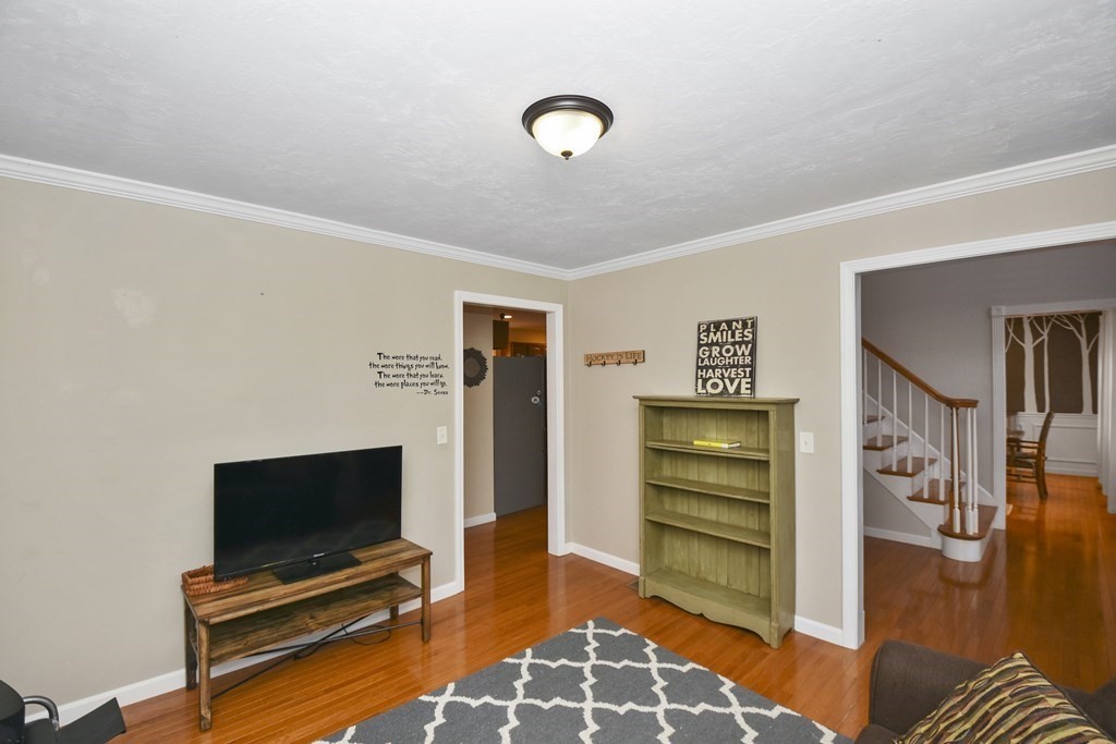 26 Tannery Road Sturbridge, MA 01518 - Photo 8 of 42 a living room with furniture and a flat screen tv
