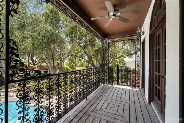 a view of balcony with wooden floor