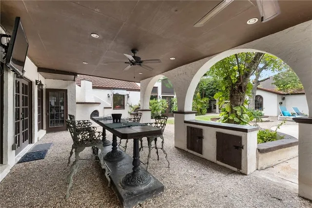 a view of a house with a balcony and a garage