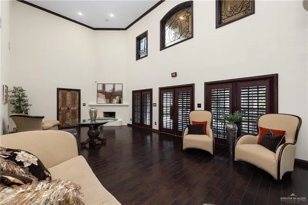 a living room with furniture or couch and a large window