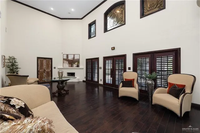 a living room with furniture or couch and a large window